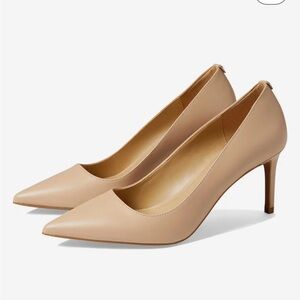 Brand new, never worn Michael Kors nude pumps